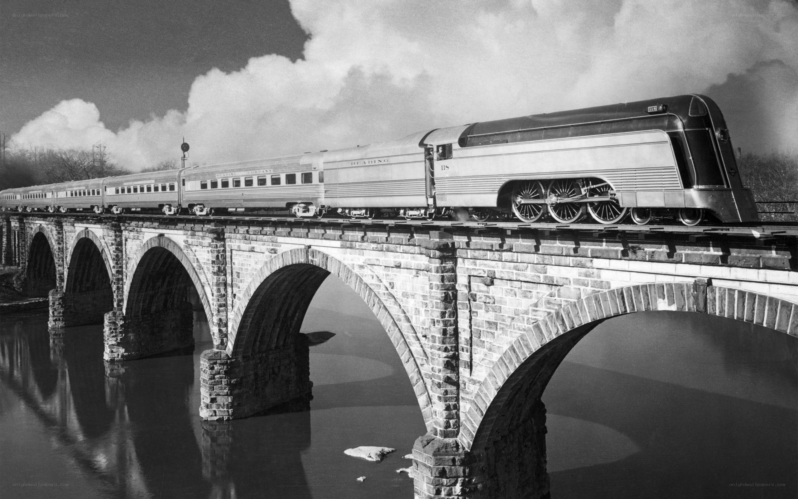 Train on a stone bridge