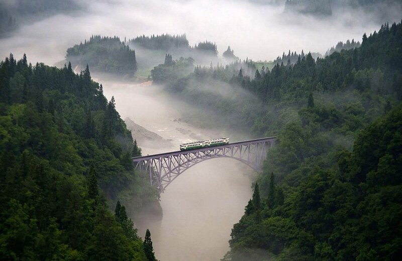 Train on Arched Bridge