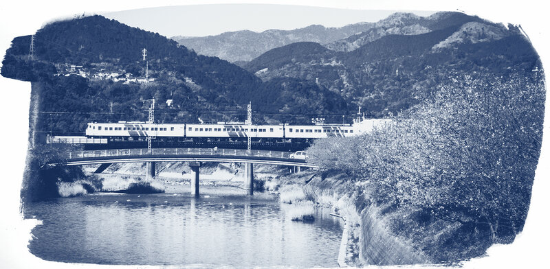 Train on Bridge — Blue