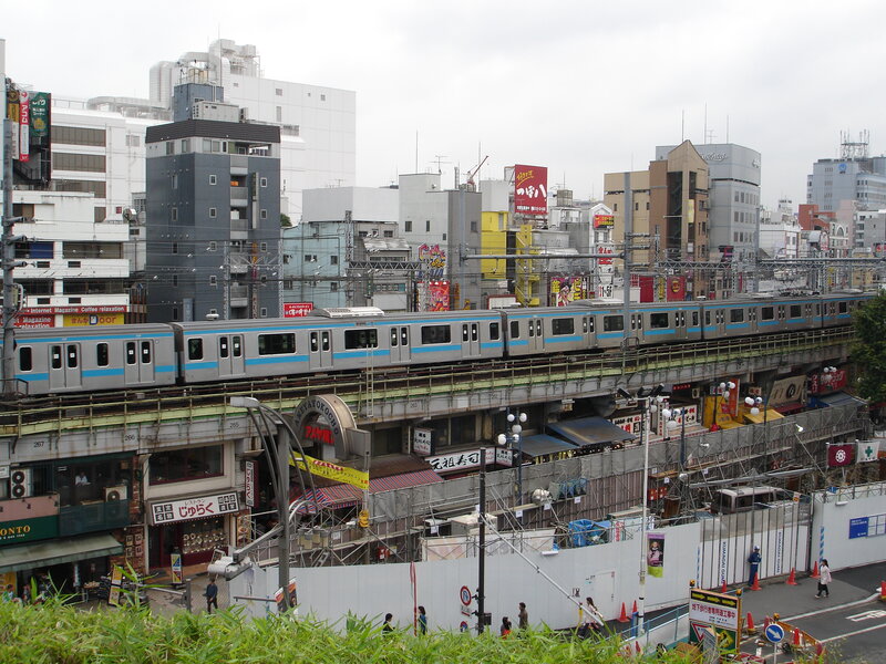 Train on Elevated Track — Gray, Urban