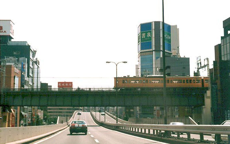 Train on elevated track in city