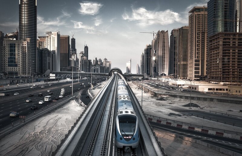 Train on Elevated Tracks — Gray, Dramatic, Afternoon