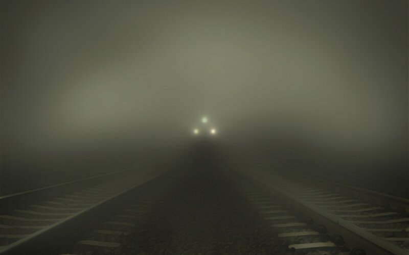 Train on Foggy Tracks — Gray