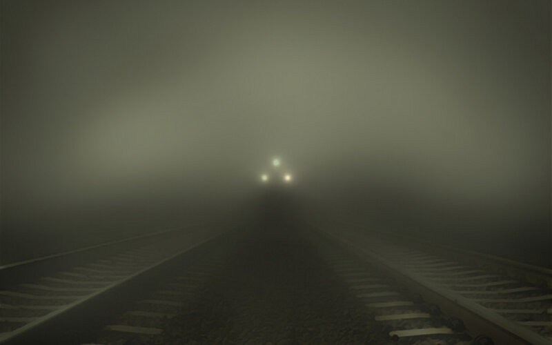Train on Foggy Tracks