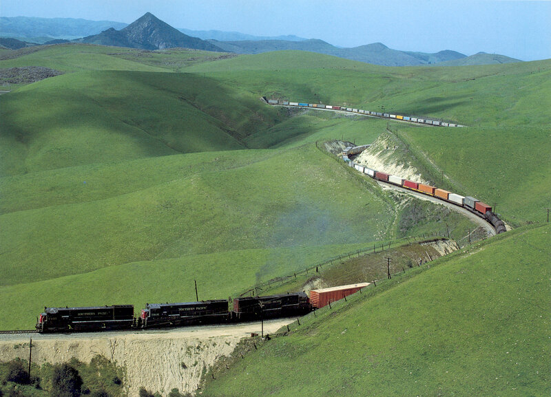 Train on green hills
