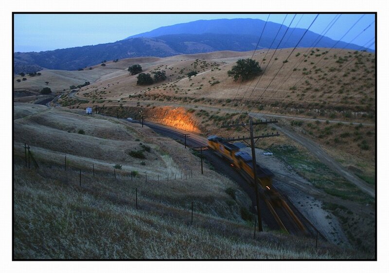 Train on hillside at dusk