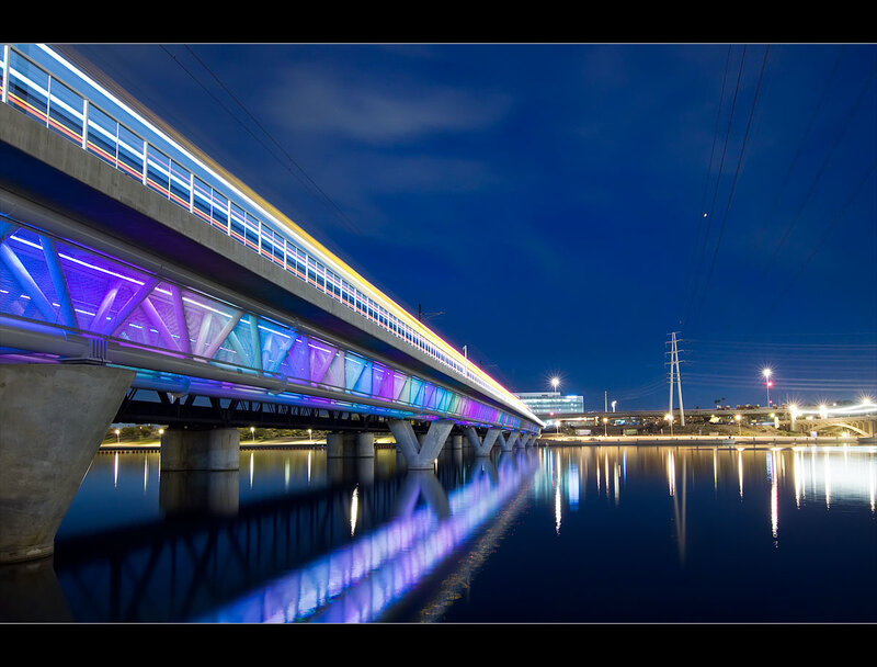Train on Illuminated Bridge