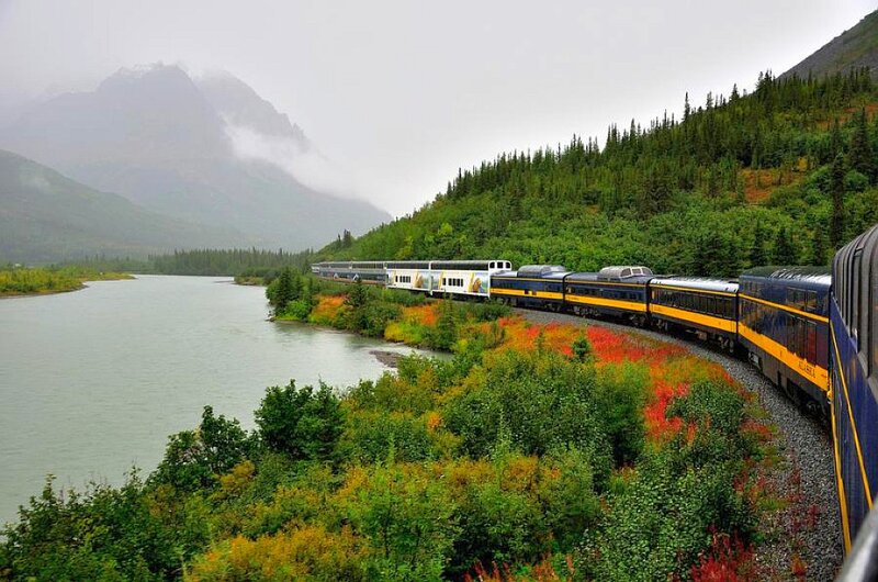 Train on Mountain Track — Green, Serene