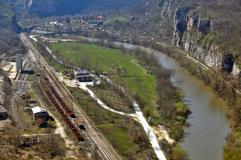 Train on River Valley
