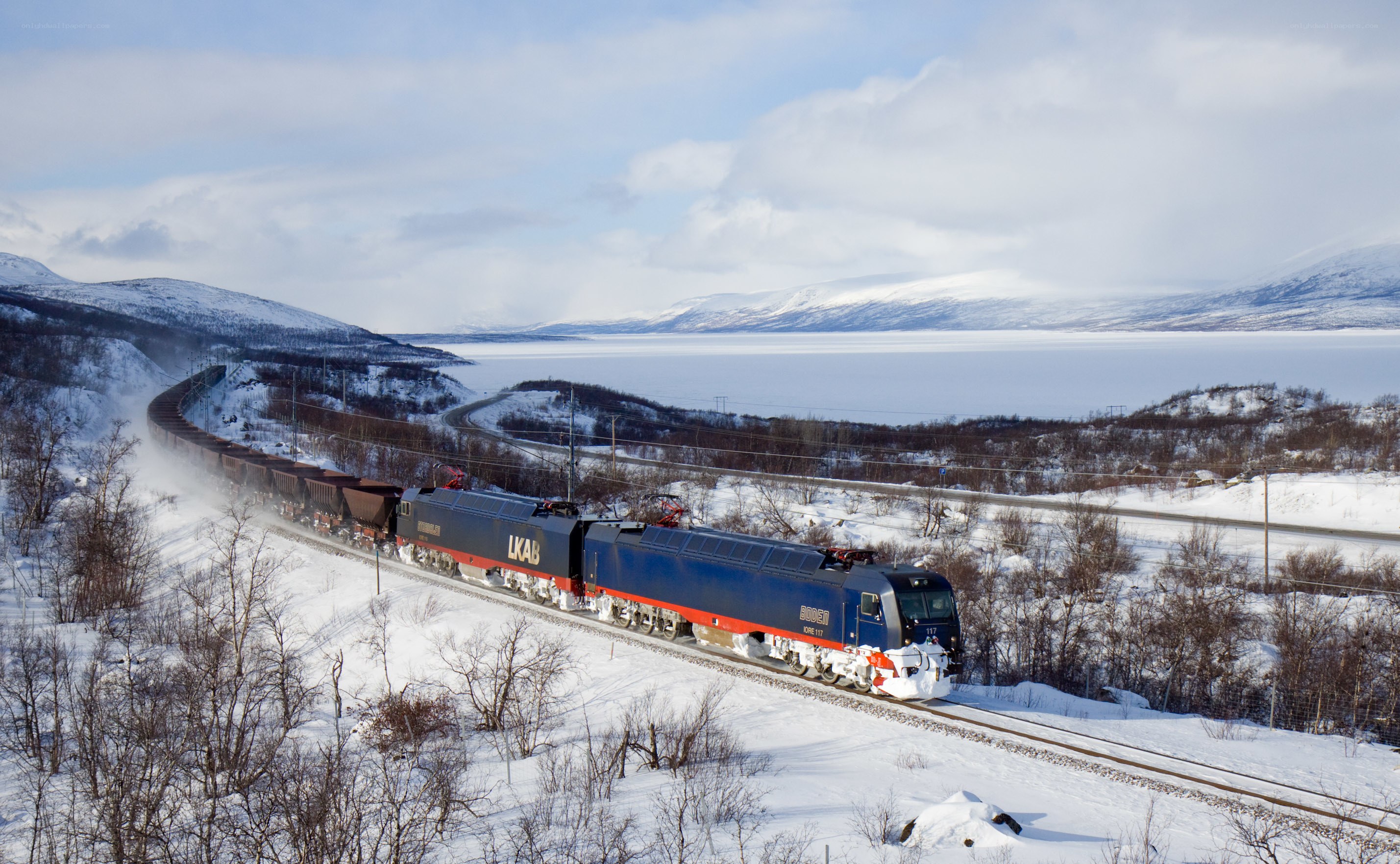 Train on snowy mountain track