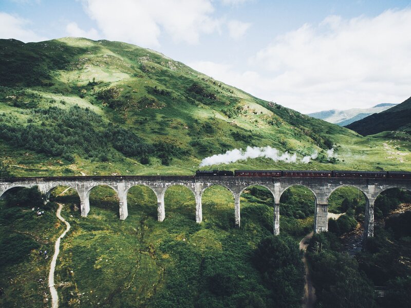 Train on Stone Bridge — Green, Serene
