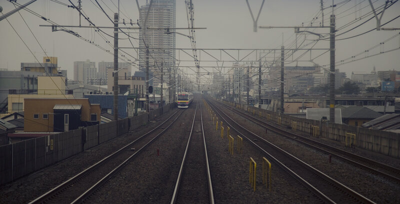 Train on Tracks — Gray, Dramatic