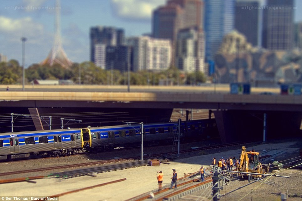 Train on tracks near city