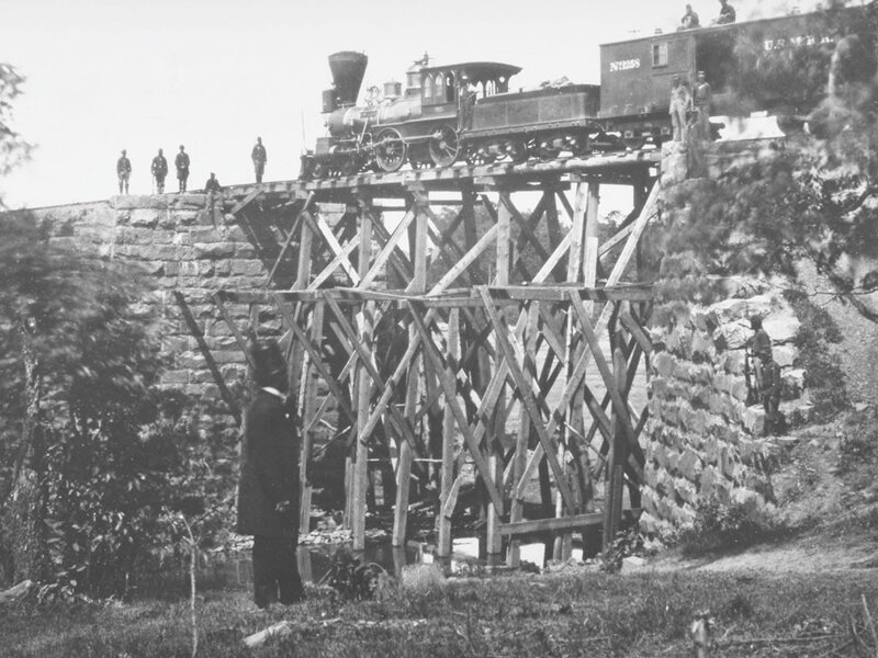 Train on wooden trestle bridge