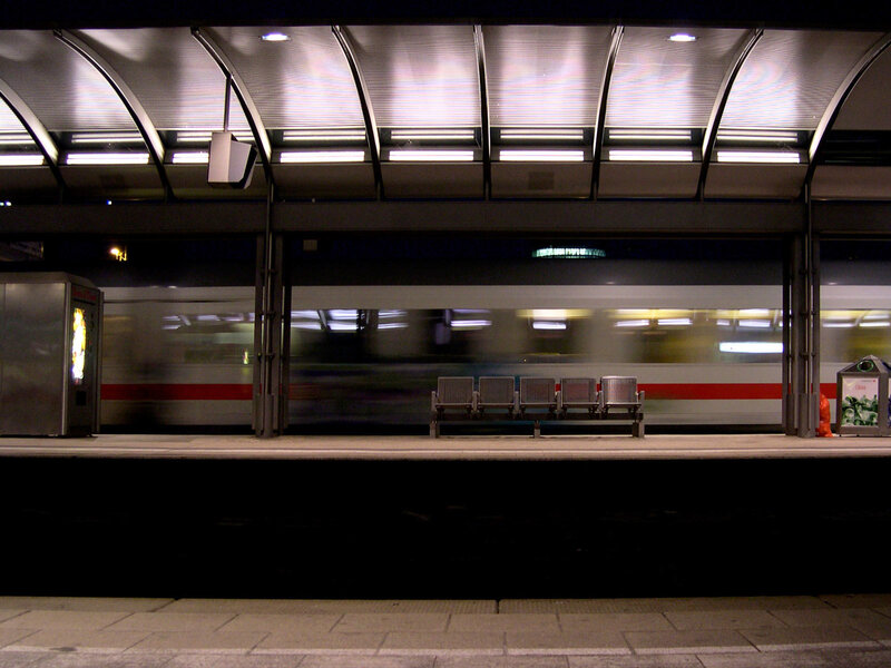 Train passing at night station