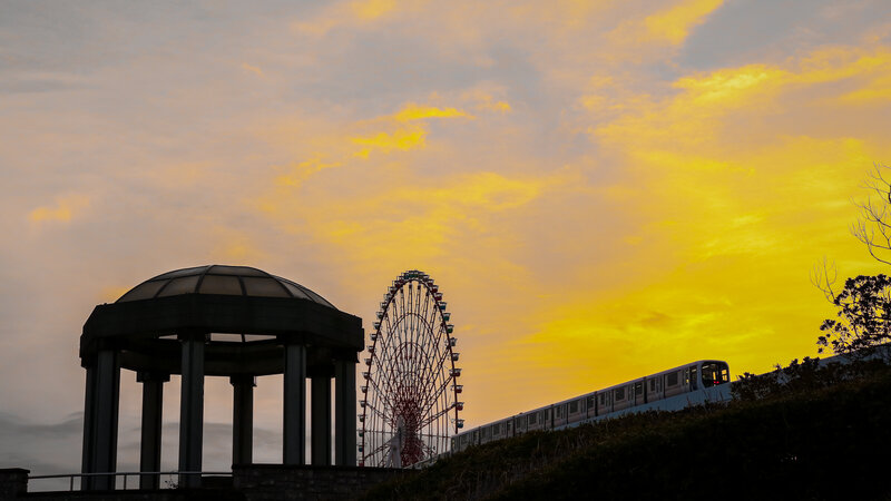 Train Passing Ferris Wheel