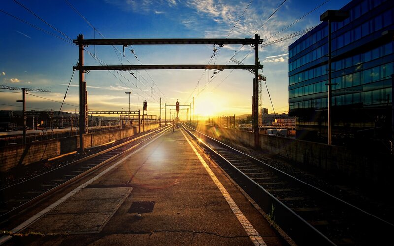 Train Station at Sunset — Blue, Dramatic, Photograph, Sun