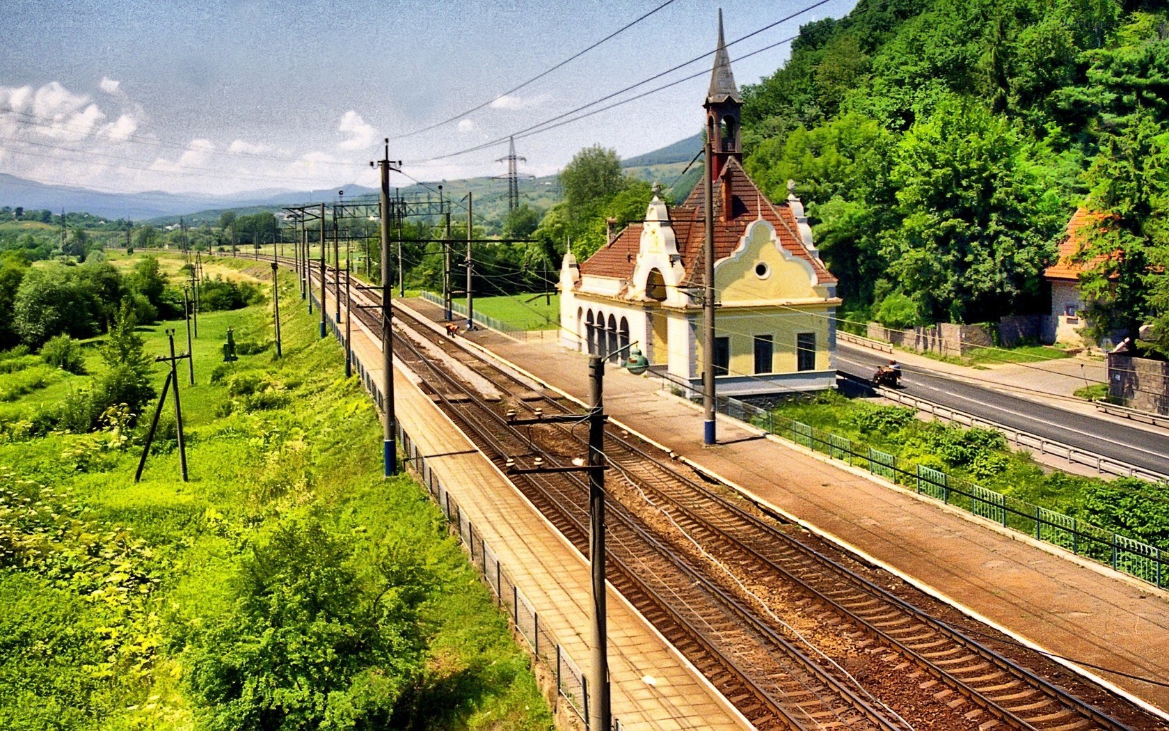 Train station in a green valley