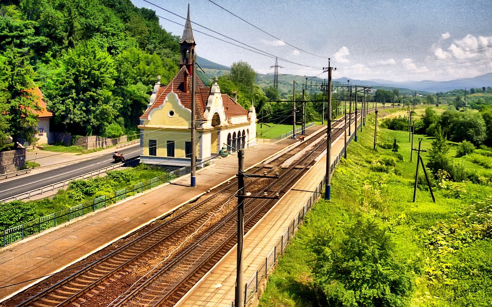 Train station in a green valley
