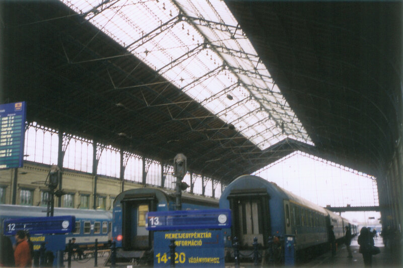 Train station interior with blue trains
