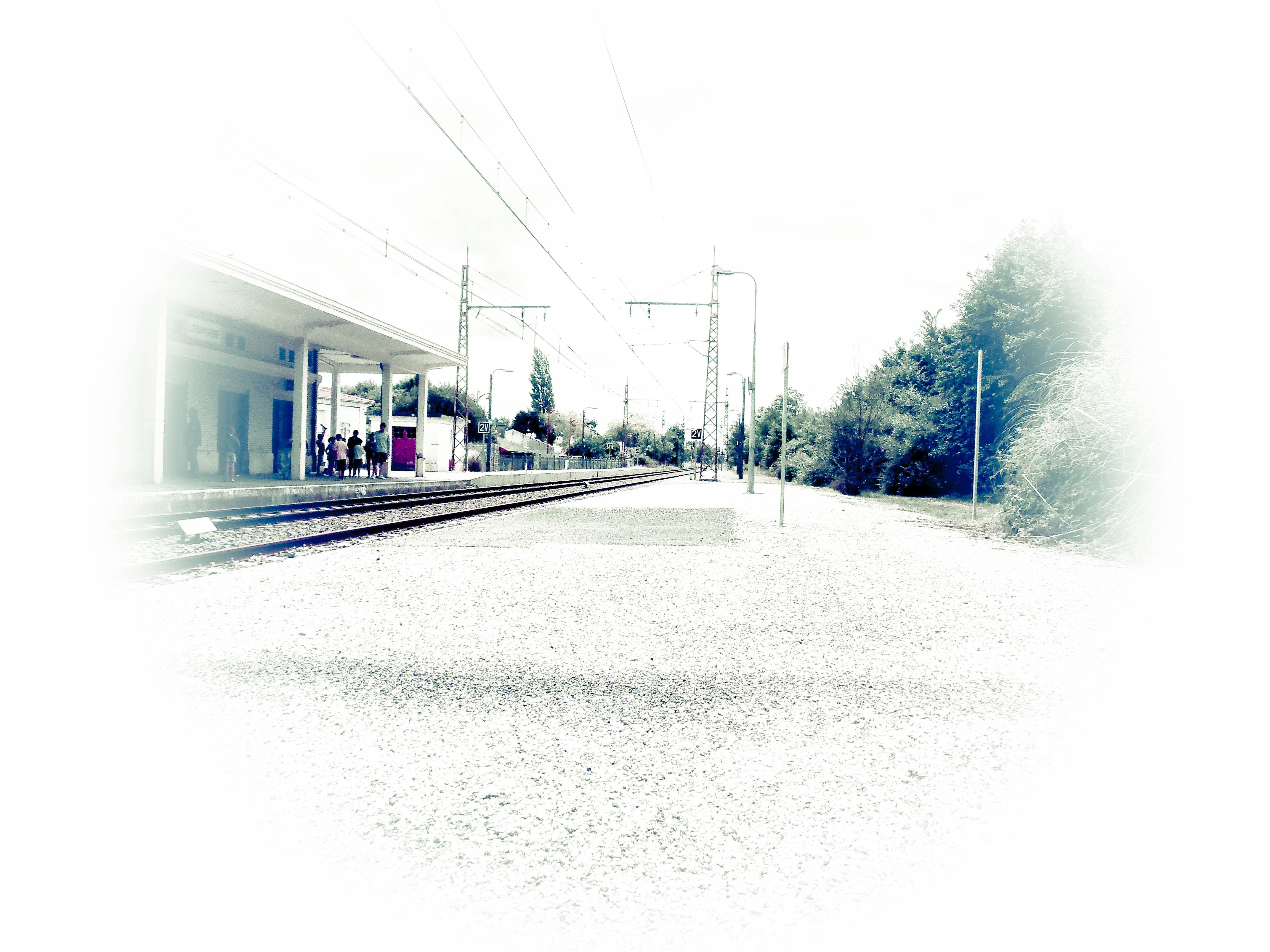 Train station platform with people