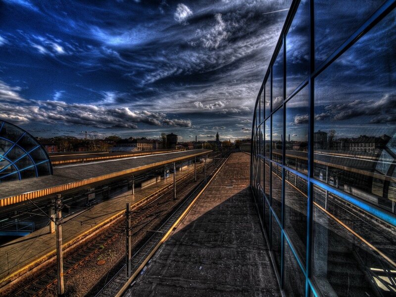 Train station under dramatic sky