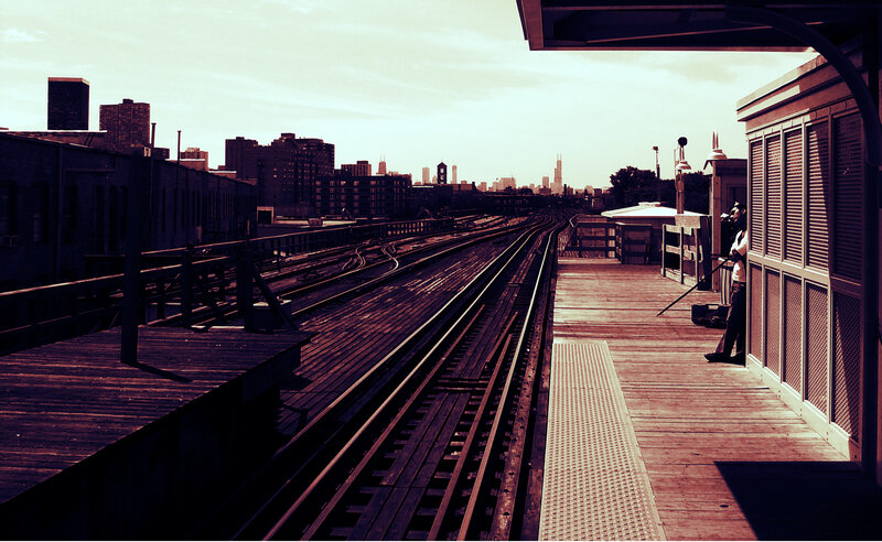 Train station with city skyline