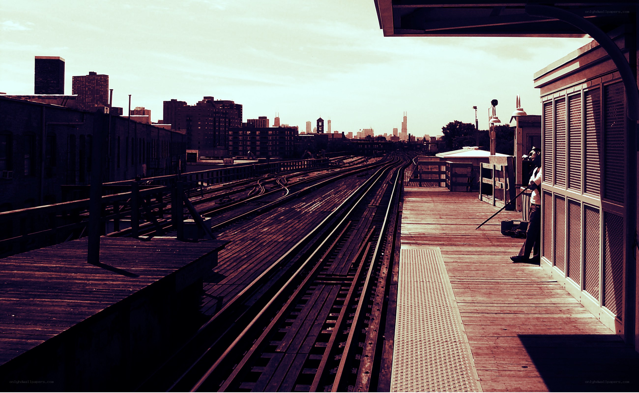 Train station with city skyline