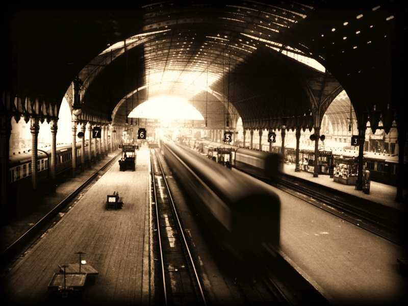 Train station with moving train