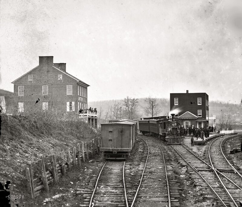Train station with steam locomotive