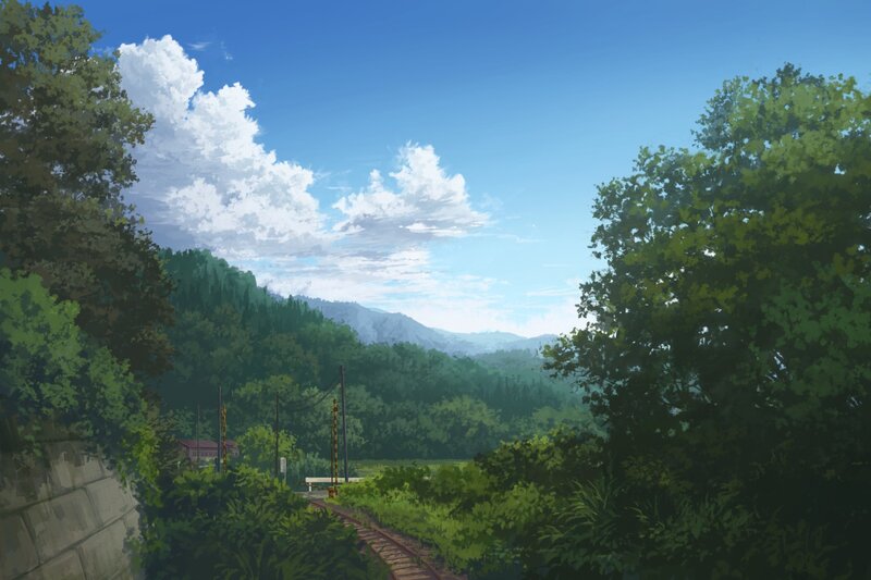 Train track through forested valley