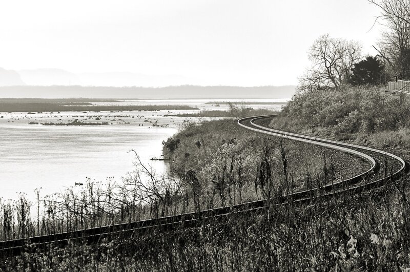 Train tracks along a river