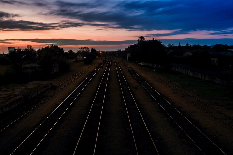 Train Tracks at Dusk — Blue, Dramatic