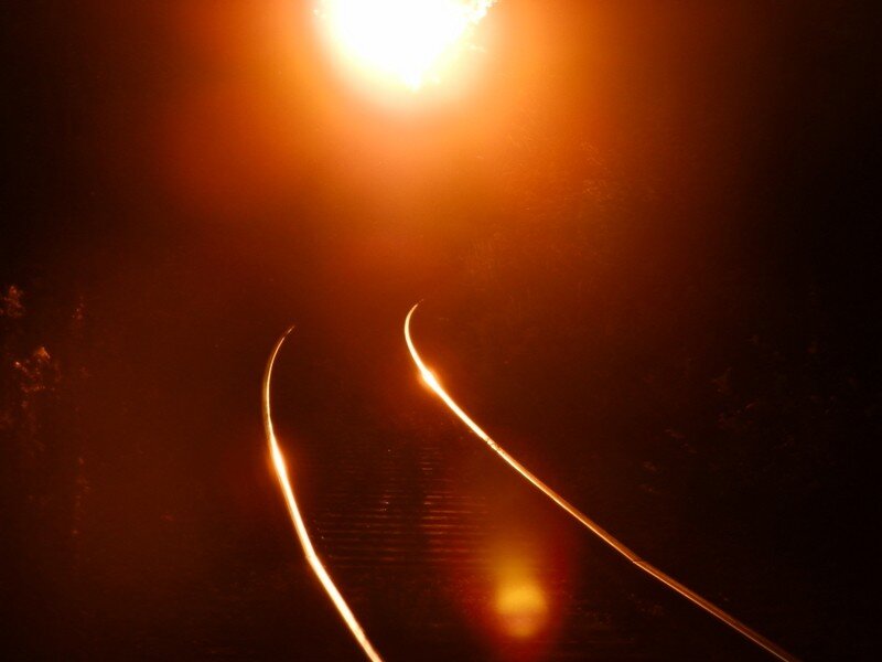 Train Tracks at Night — Orange, Dramatic
