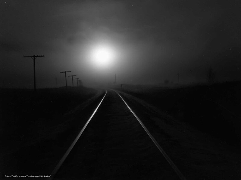 Train tracks at night