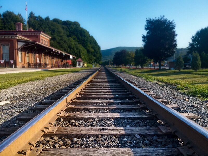 Train Tracks at Station — Blue