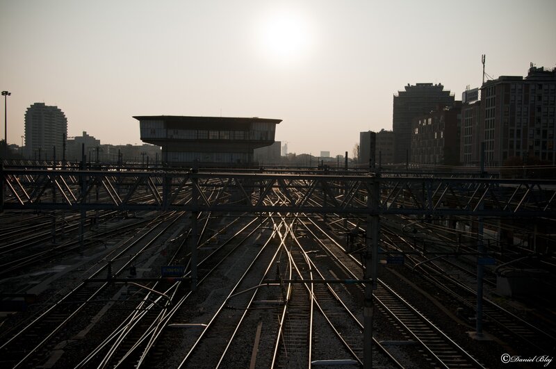 Train Tracks at Station — Gray, Dramatic