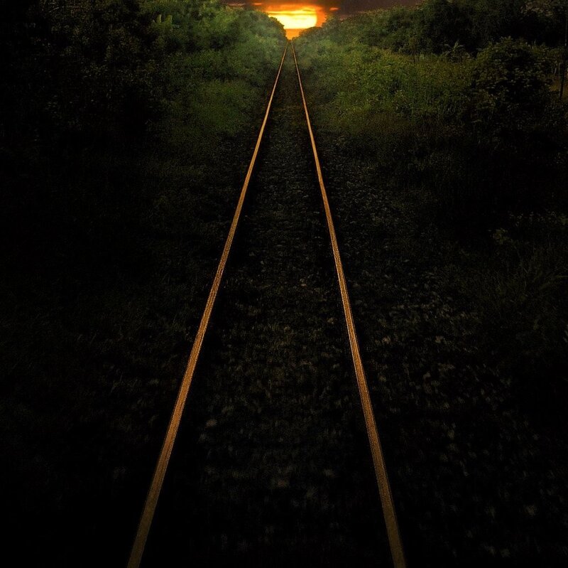 Train tracks at sunset
