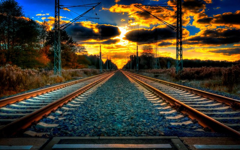 Train Tracks at Sunset — Blue, Dramatic