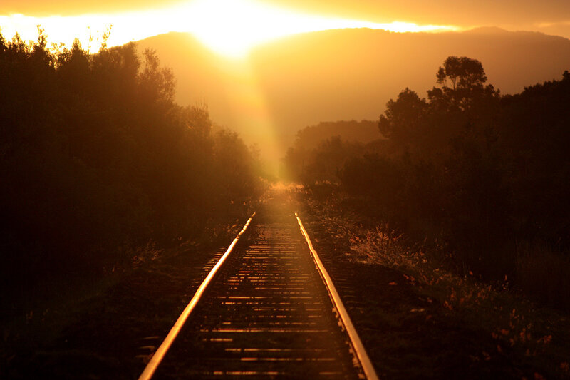 Train Tracks at Sunset — Orange, Serene, Photograph, Mountains