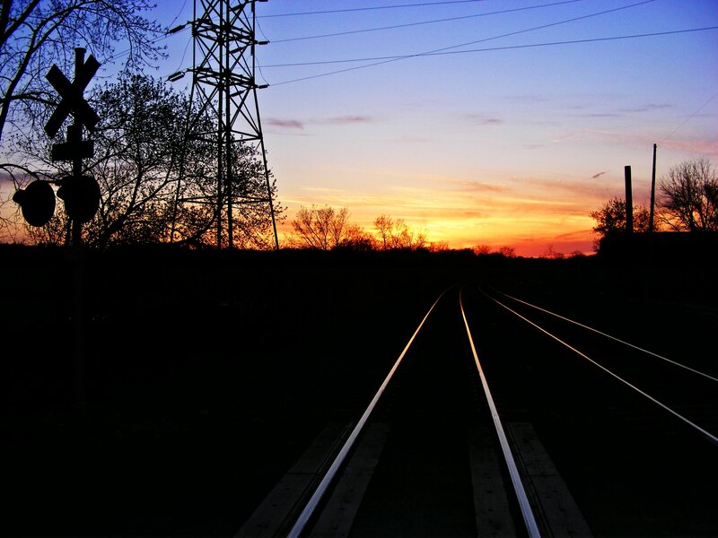 Train Tracks at Sunset — Orange, Serene