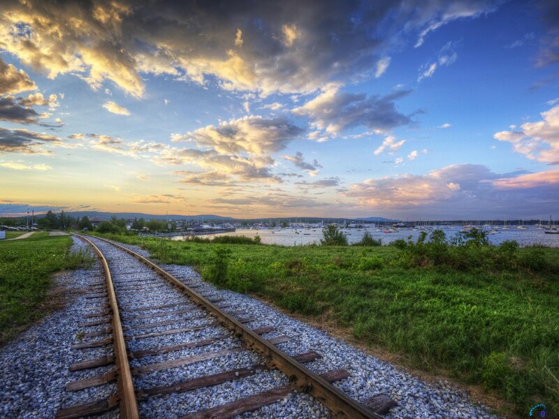Train Tracks by Water — Blue, Dramatic