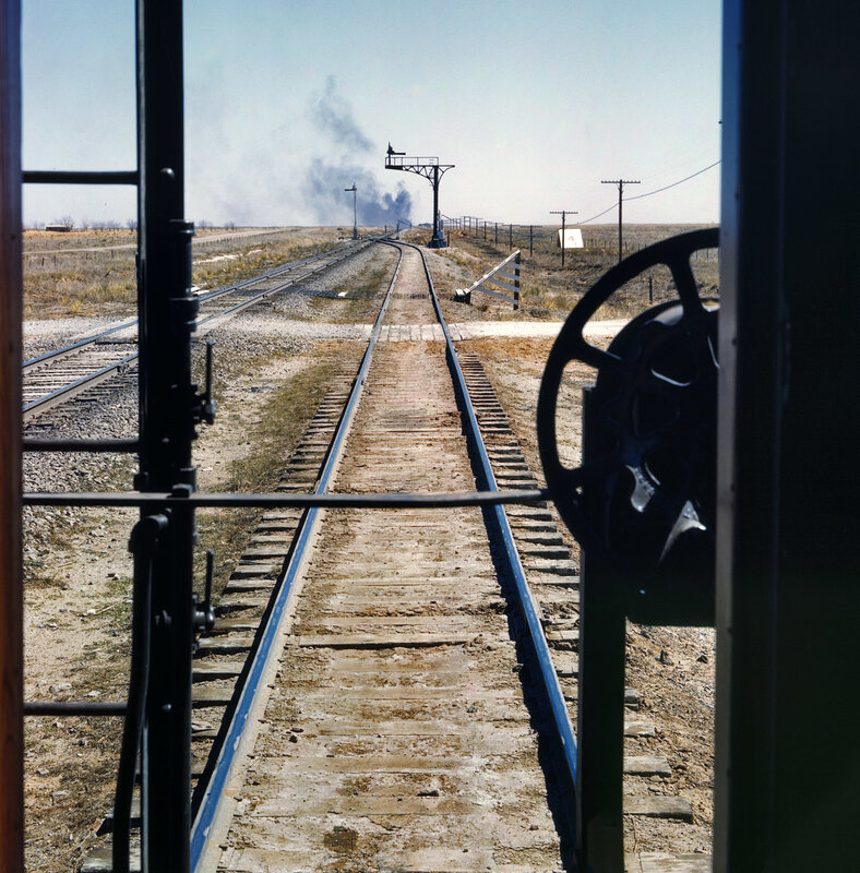 Train tracks in a desert landscape