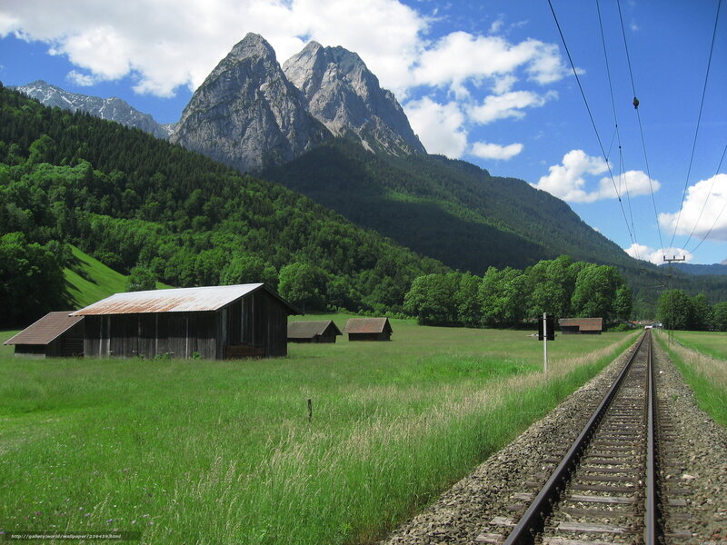 Train tracks in a mountain valley