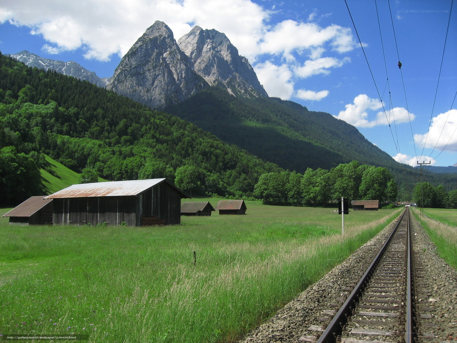 Train tracks in a mountain valley