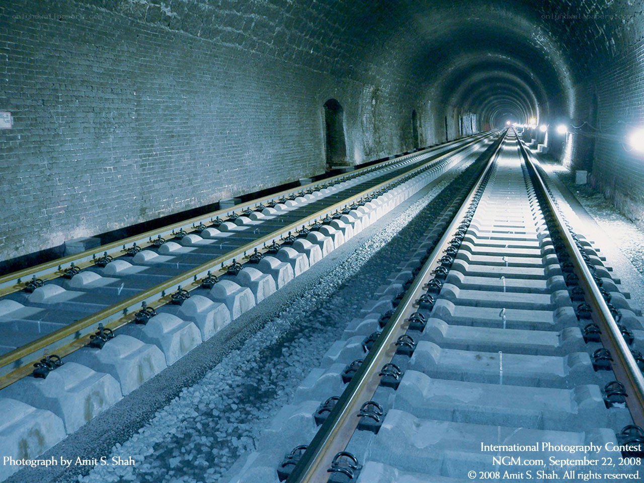 Train tracks in a tunnel