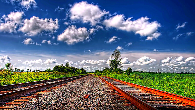 Train Tracks in Field — Blue