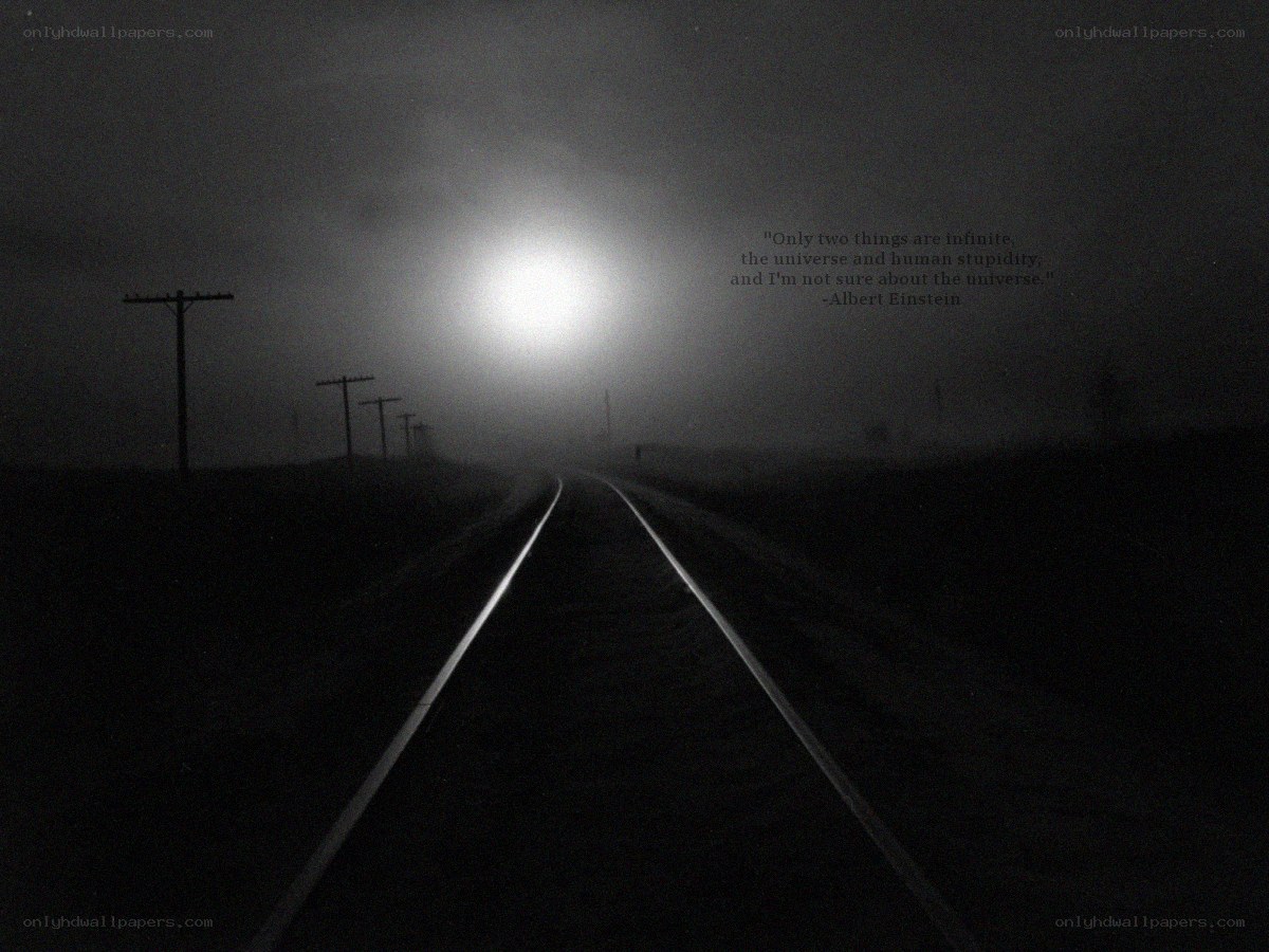 Train tracks in fog