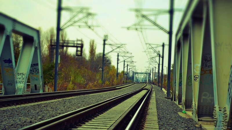 Train Tracks on Bridge — Green, Dramatic