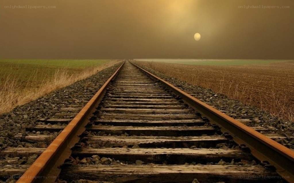 Train tracks stretch into the distance